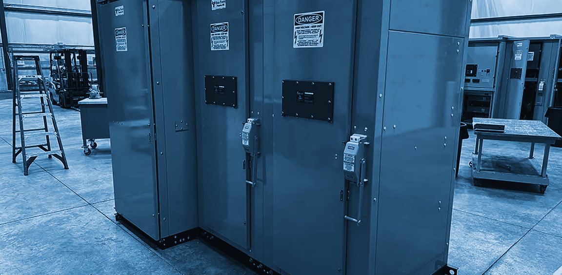Medium-voltage switchgear assembly on a shop floor before shipment