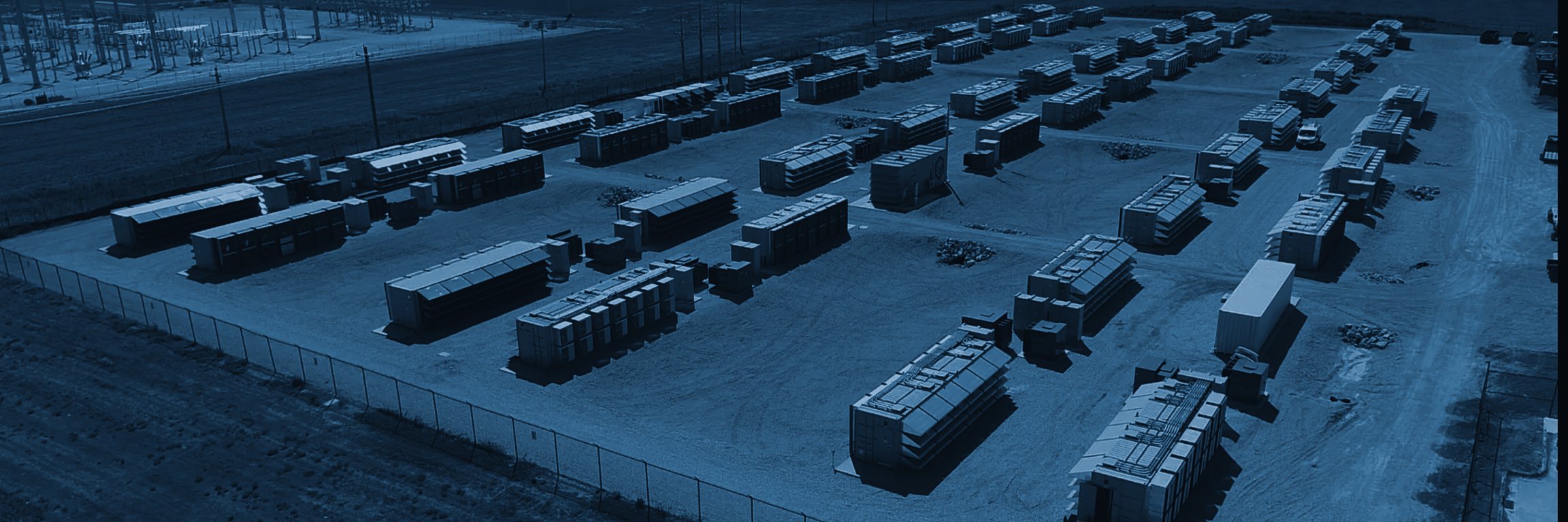 Aerial view of a utility-scale container site with its own substation alongside
