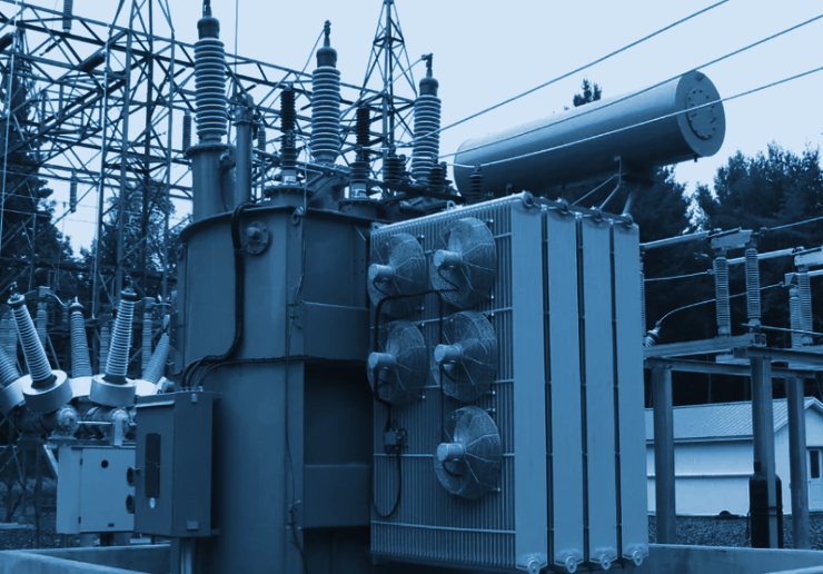 Substation power transformer with radiator banks, cooling fans, conservator and high-voltage bushings